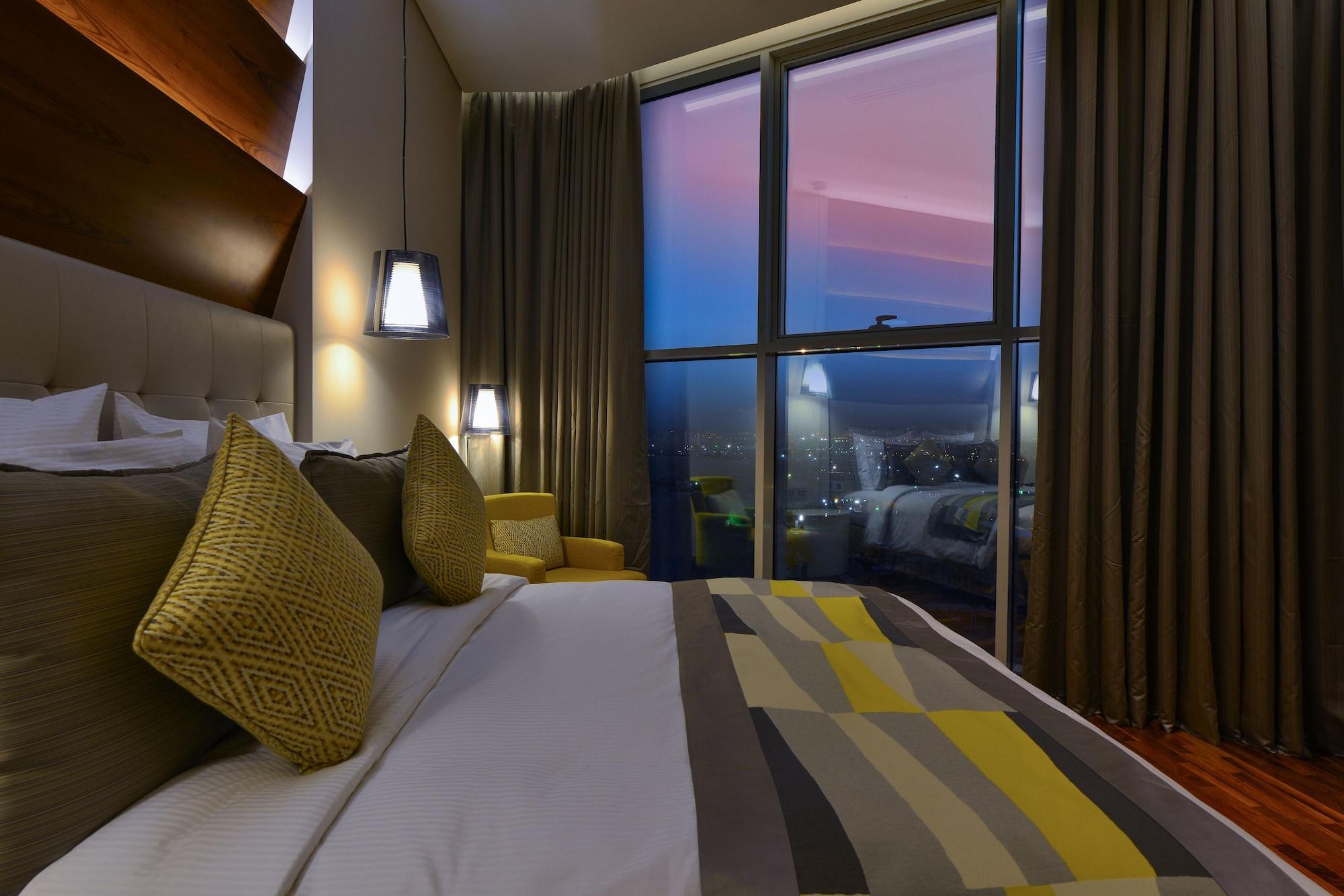 ดิ อเวนิว อะ เมอร์วับ โฮเต็ล Hotel โดฮา ภายนอก รูปภาพ A bedroom at the hotel