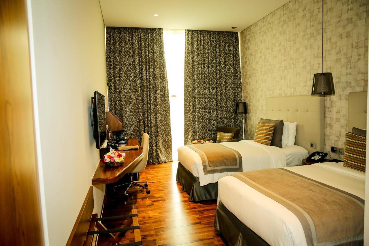 ดิ อเวนิว อะ เมอร์วับ โฮเต็ล Hotel โดฮา ภายนอก รูปภาพ Deluxe Room